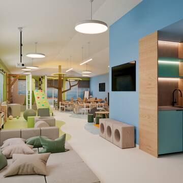 a room with a playroom and a play area