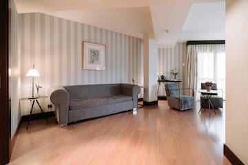 a living room with a couch and a chair