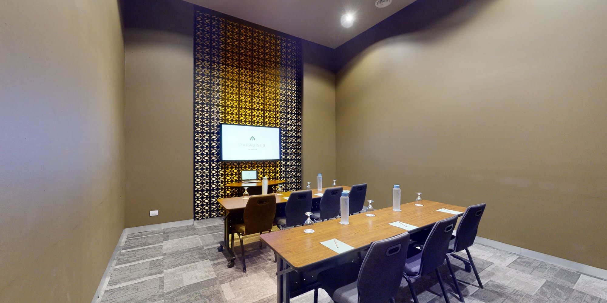 a room with a table and chairs