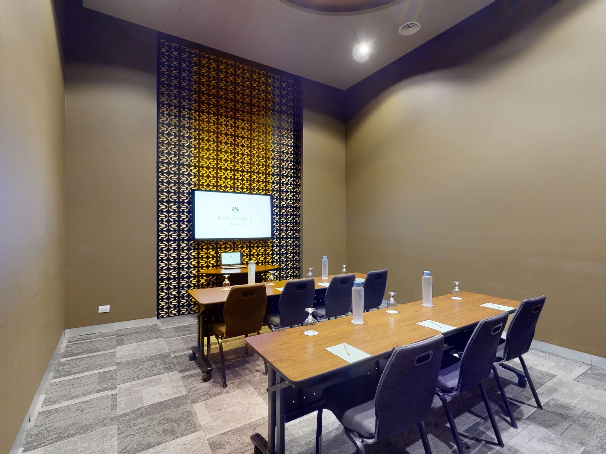 a room with a table and chairs