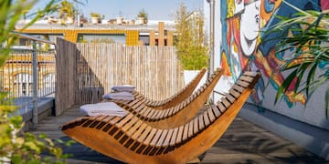 a wooden chairs on a deck