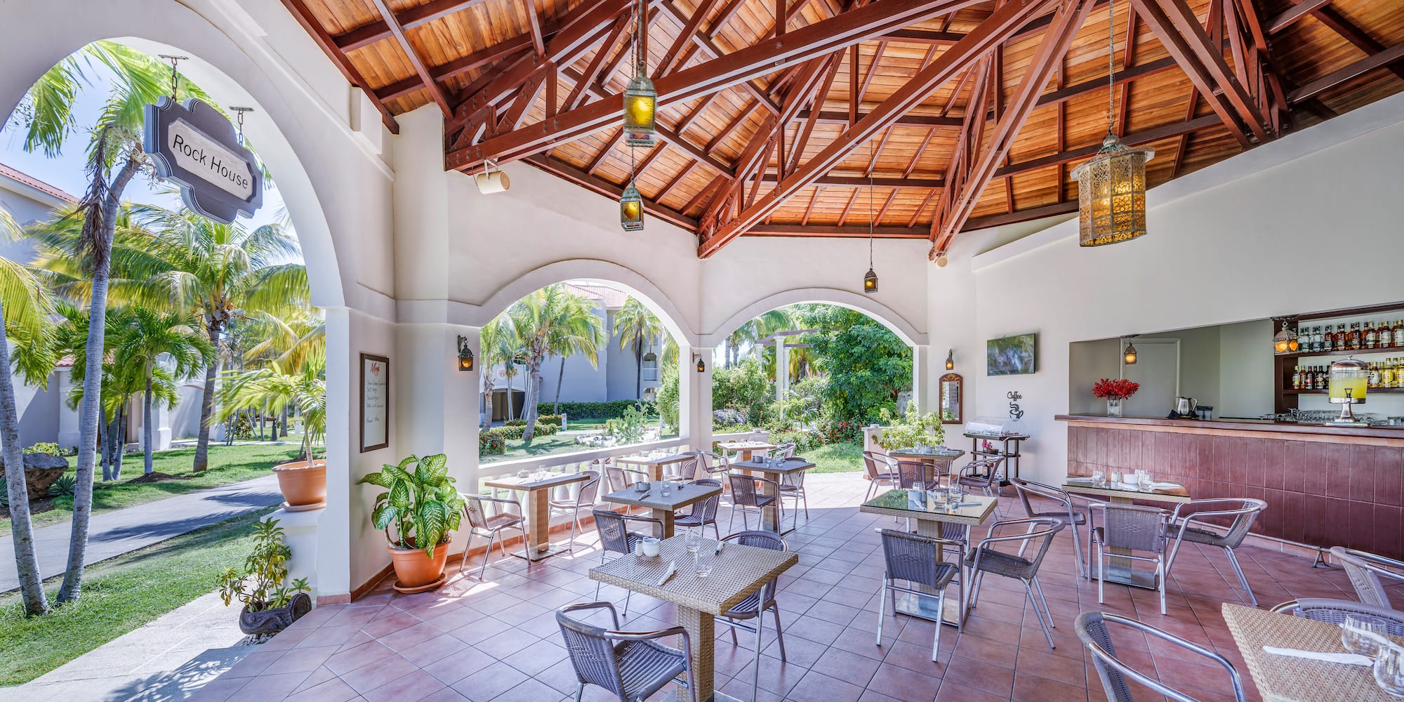 a room with tables and chairs.