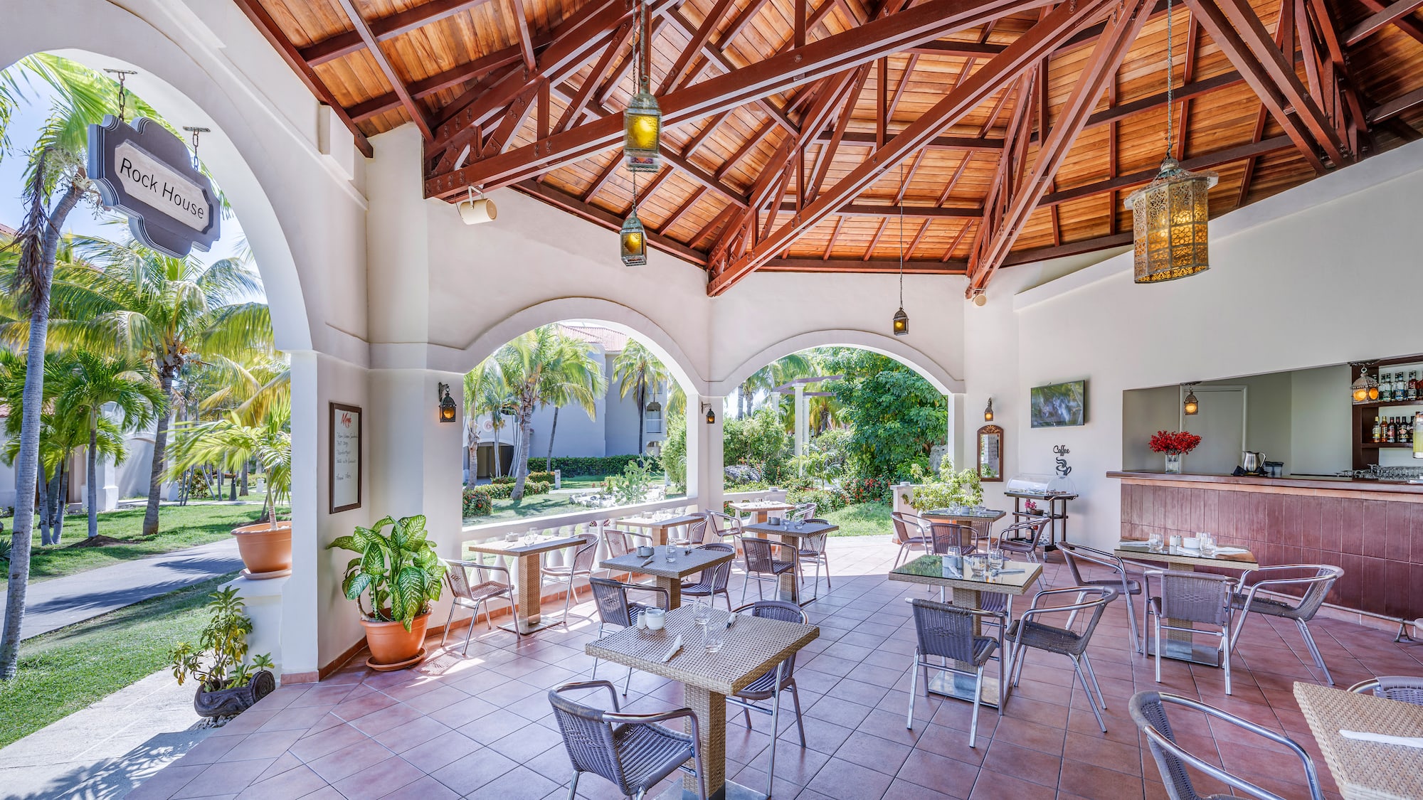 a room with tables and chairs.