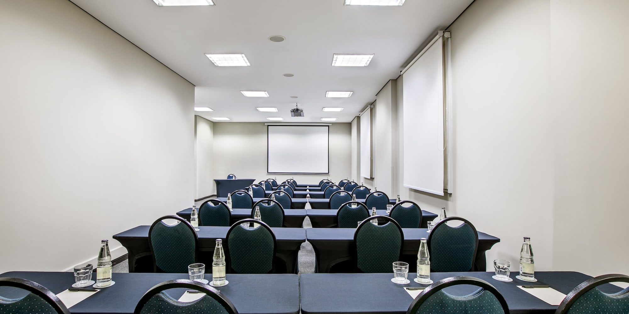 a room with tables and chairs
