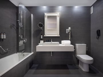 a bathroom with a sink and a bathtub