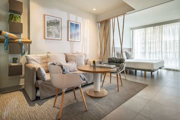a living room with a couch and a table