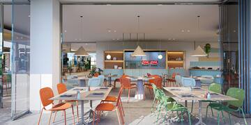 a room with tables and chairs