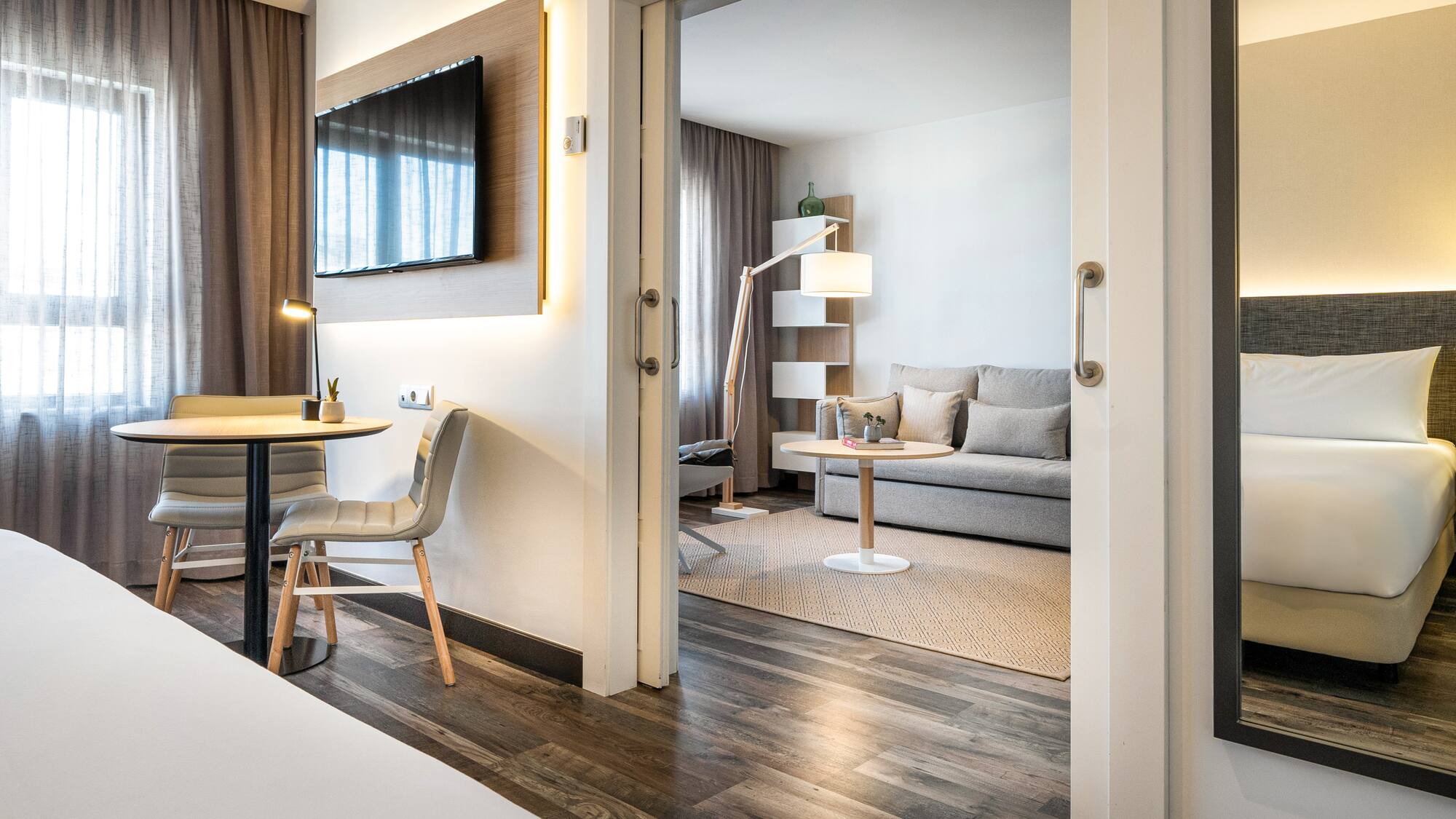 a room with a tv and a couch