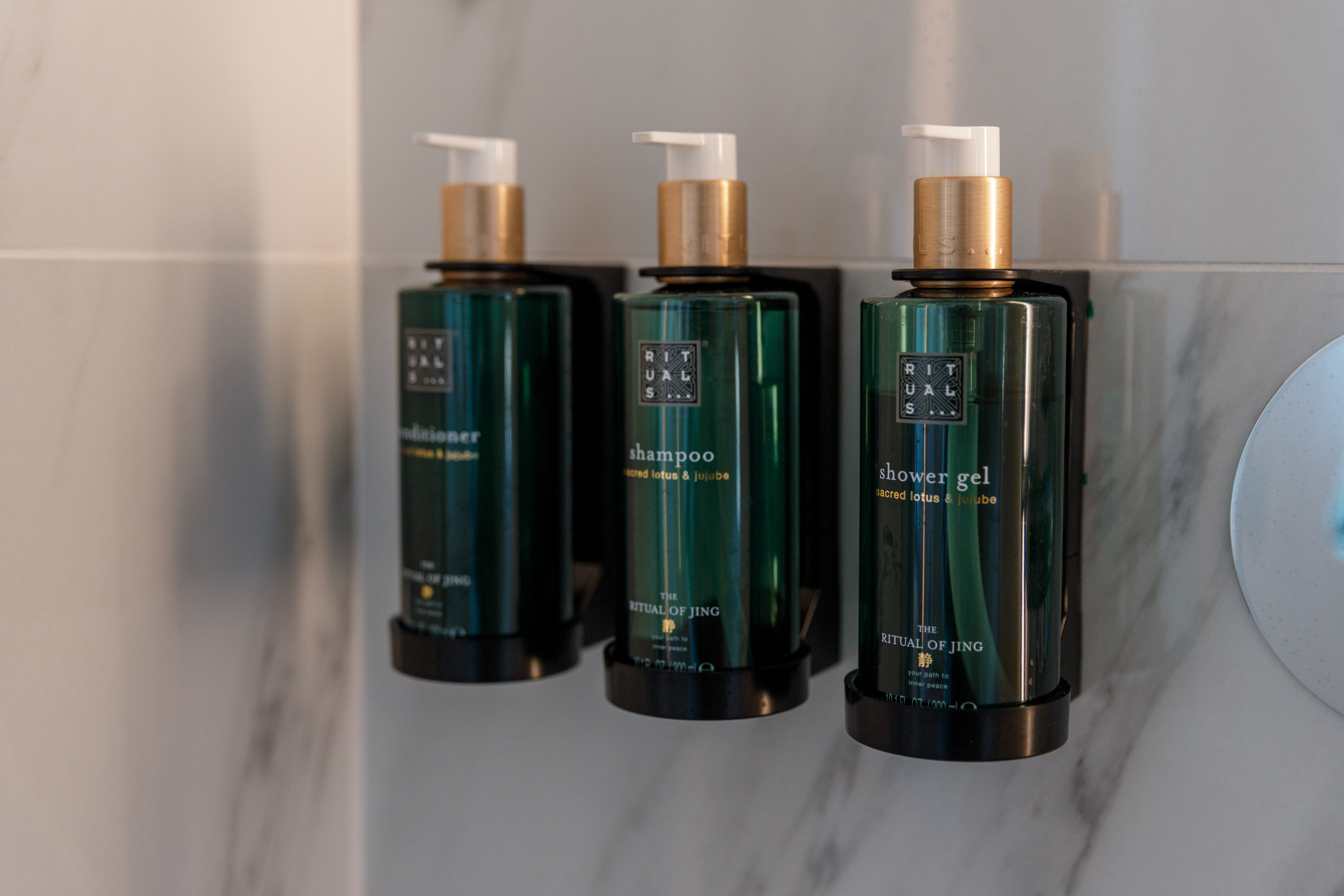 Rituals Jing shampoo, conditioner, shower gel with sacred lotus & jujube.