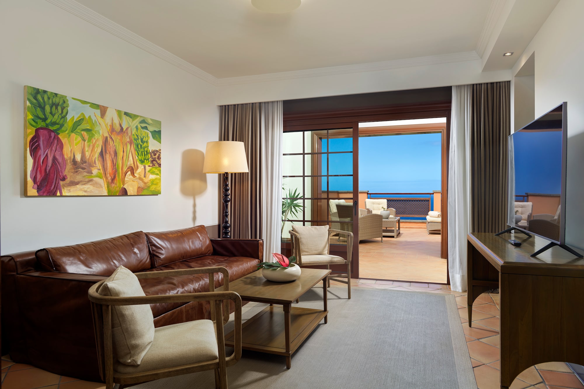 a living room with a couch and a television