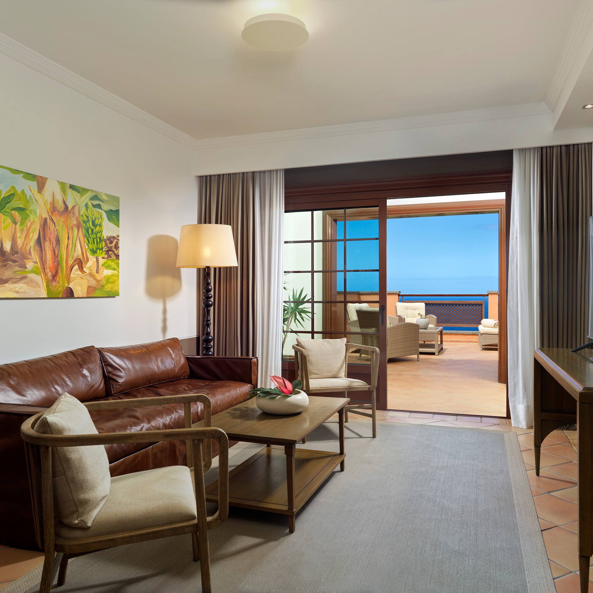 a living room with a couch and a television