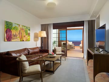 a living room with a couch and a television