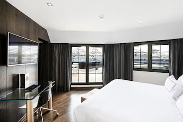 a room with a bed and a desk