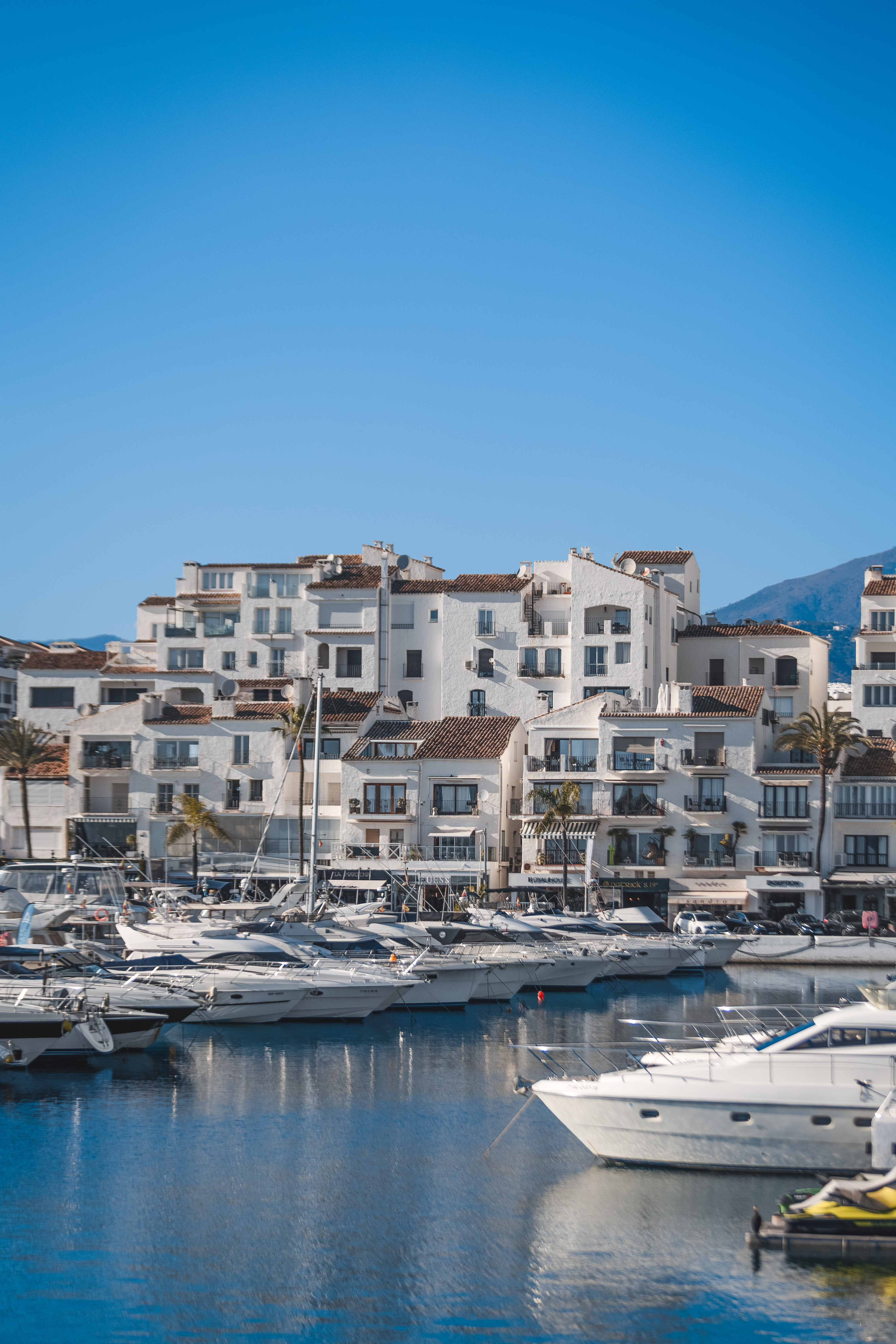 a group of boats in a harbor