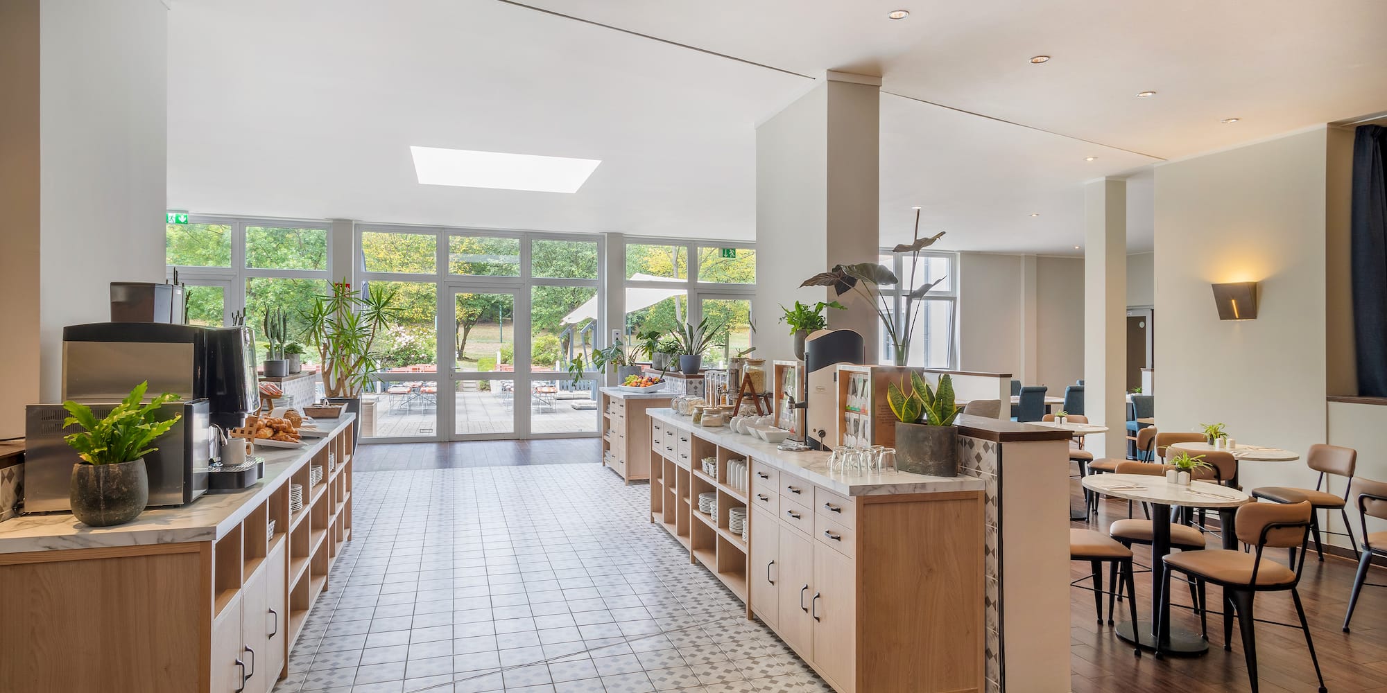 a room with a large counter and a large window