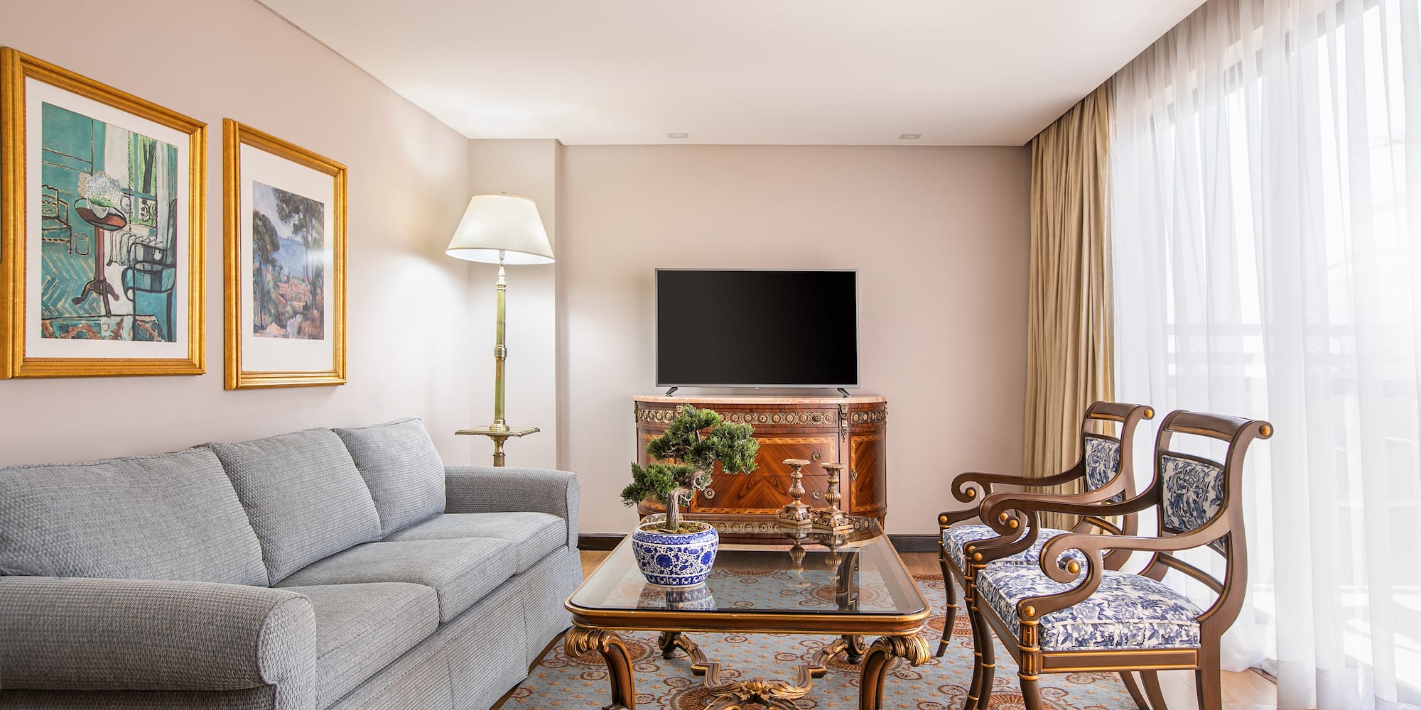 a living room with a couch and a table