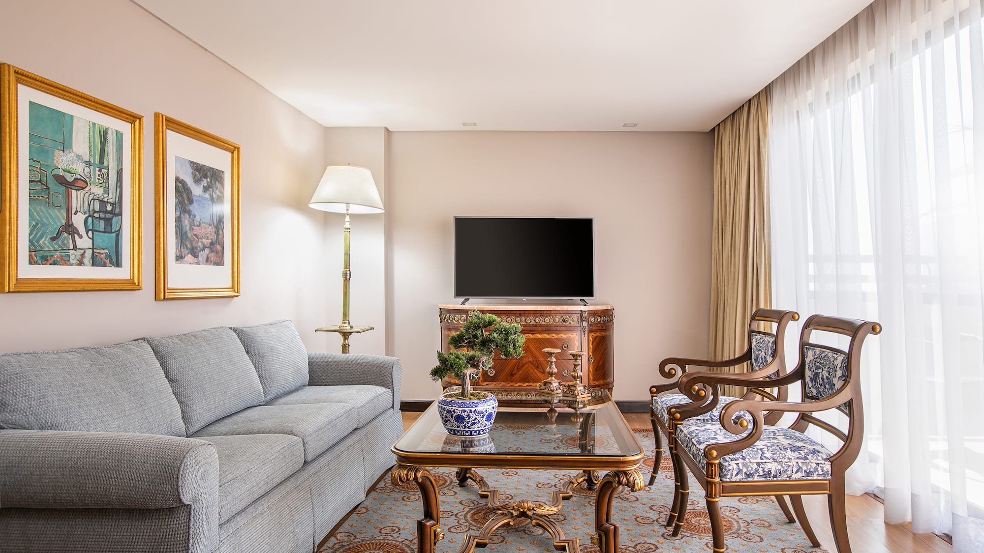 a living room with a couch and a table