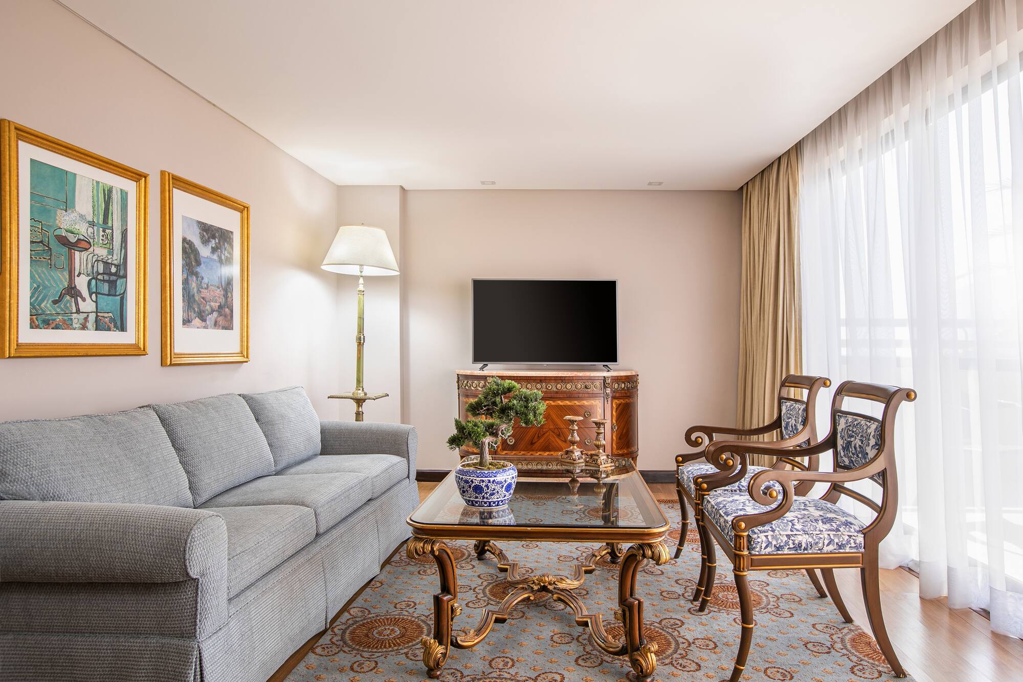 a living room with a couch and a table