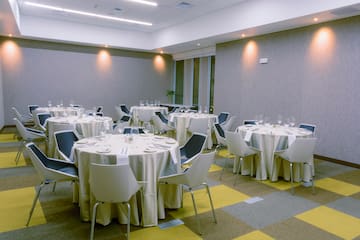 a room with tables and chairs