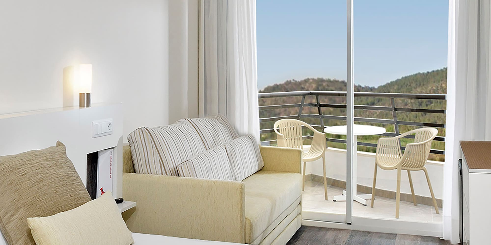 a room with a bed and a couch