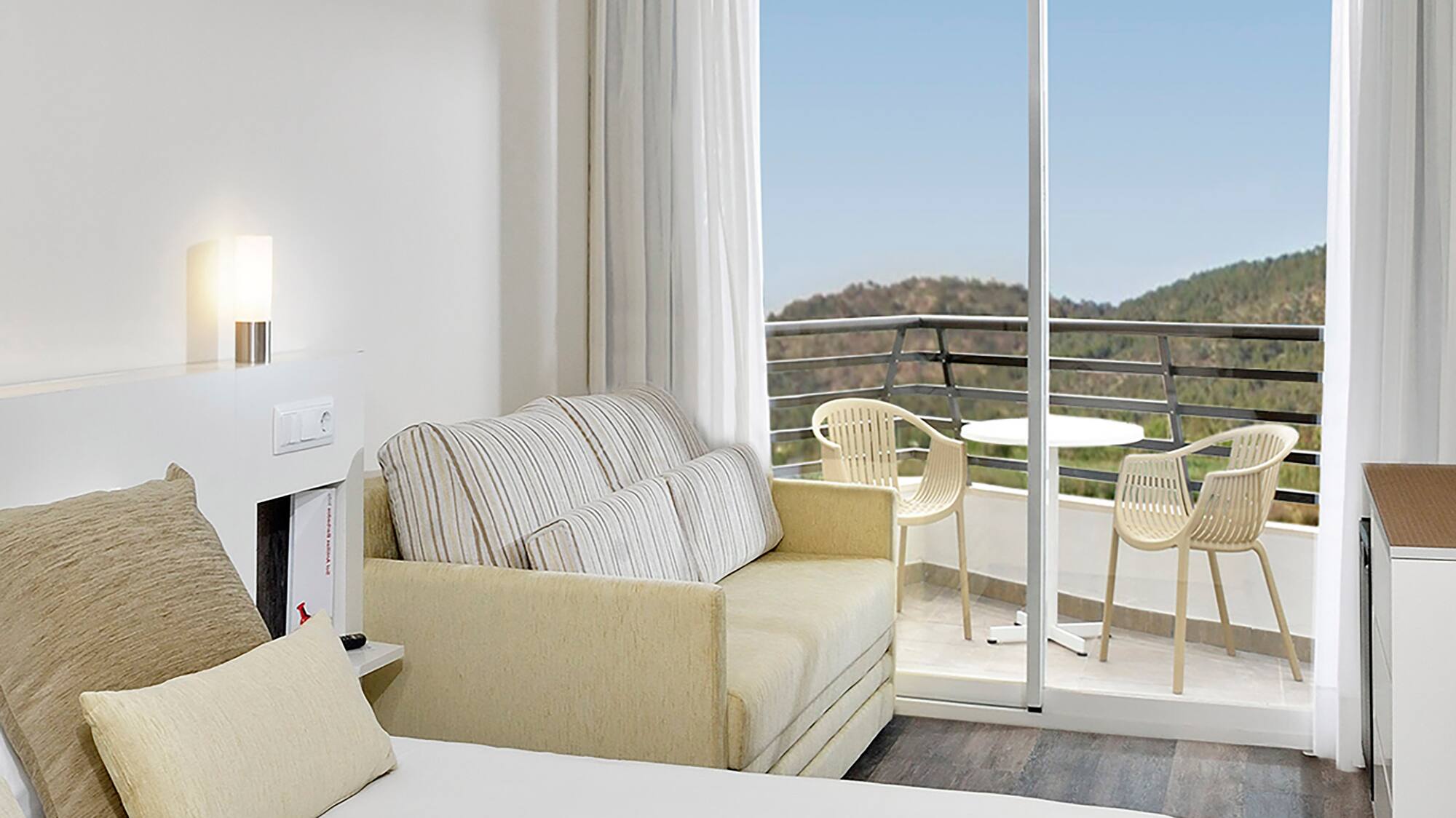 a room with a bed and a couch