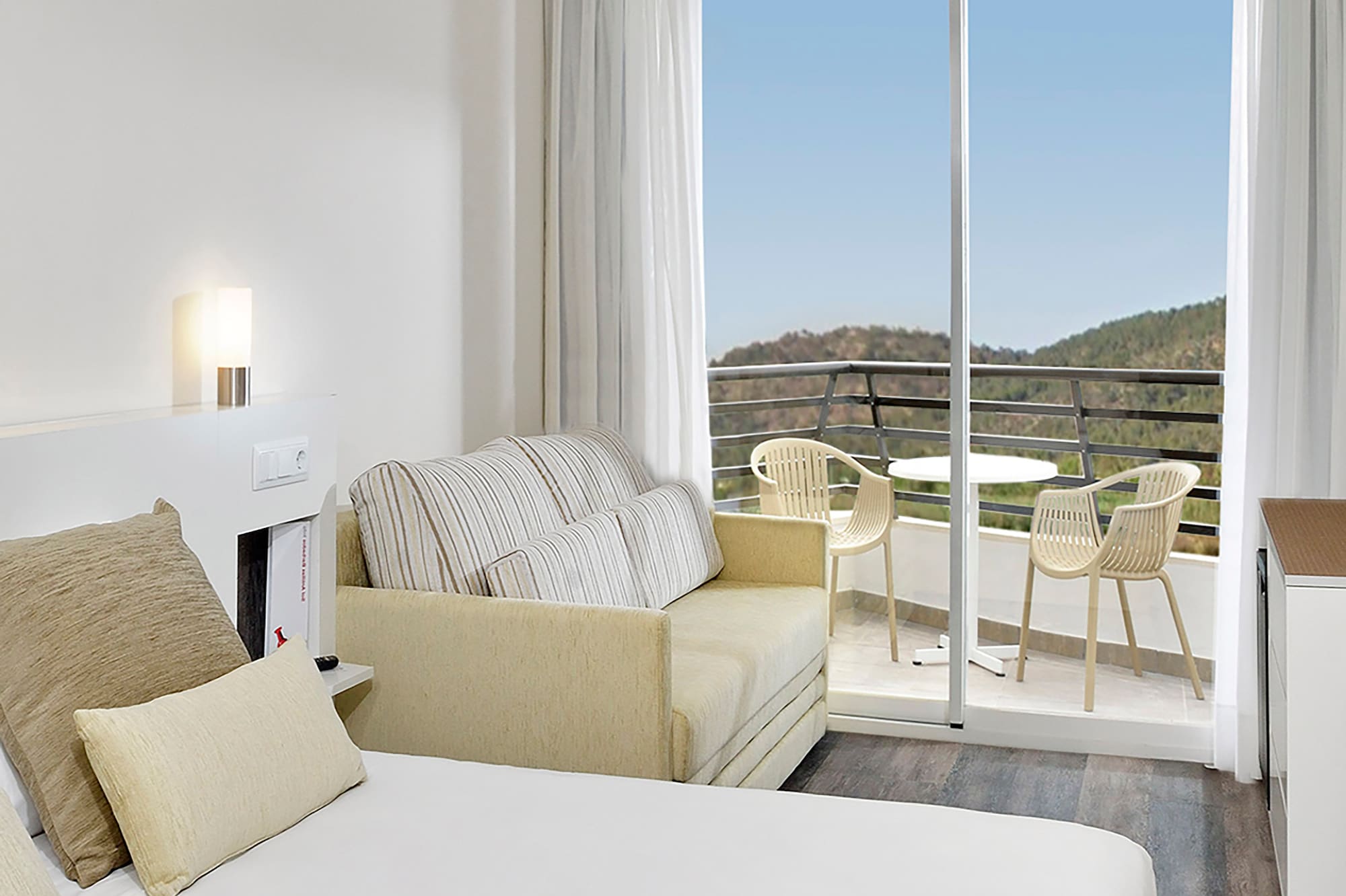 a room with a bed and a couch