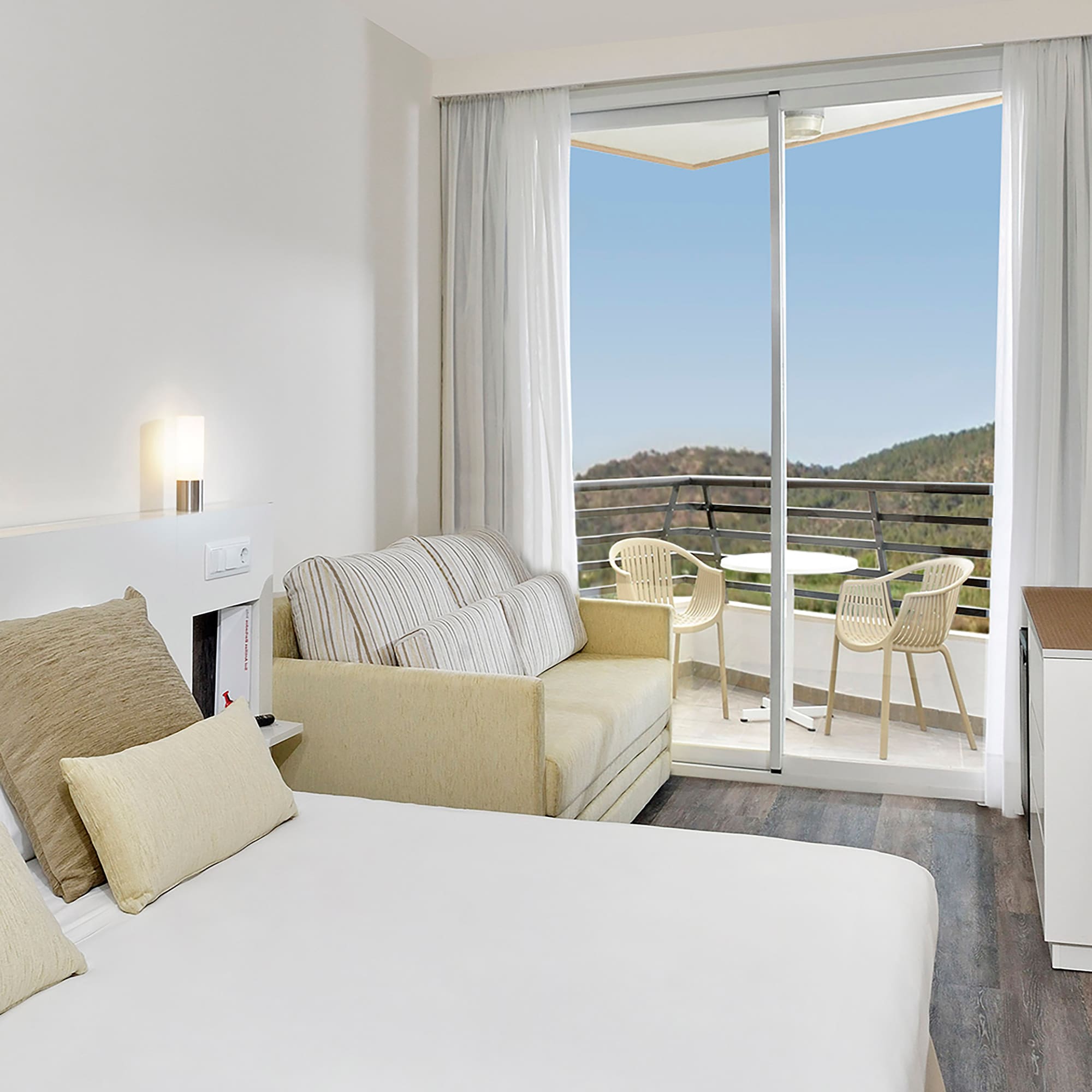 a room with a bed and a couch