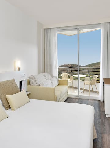 a room with a bed and a couch