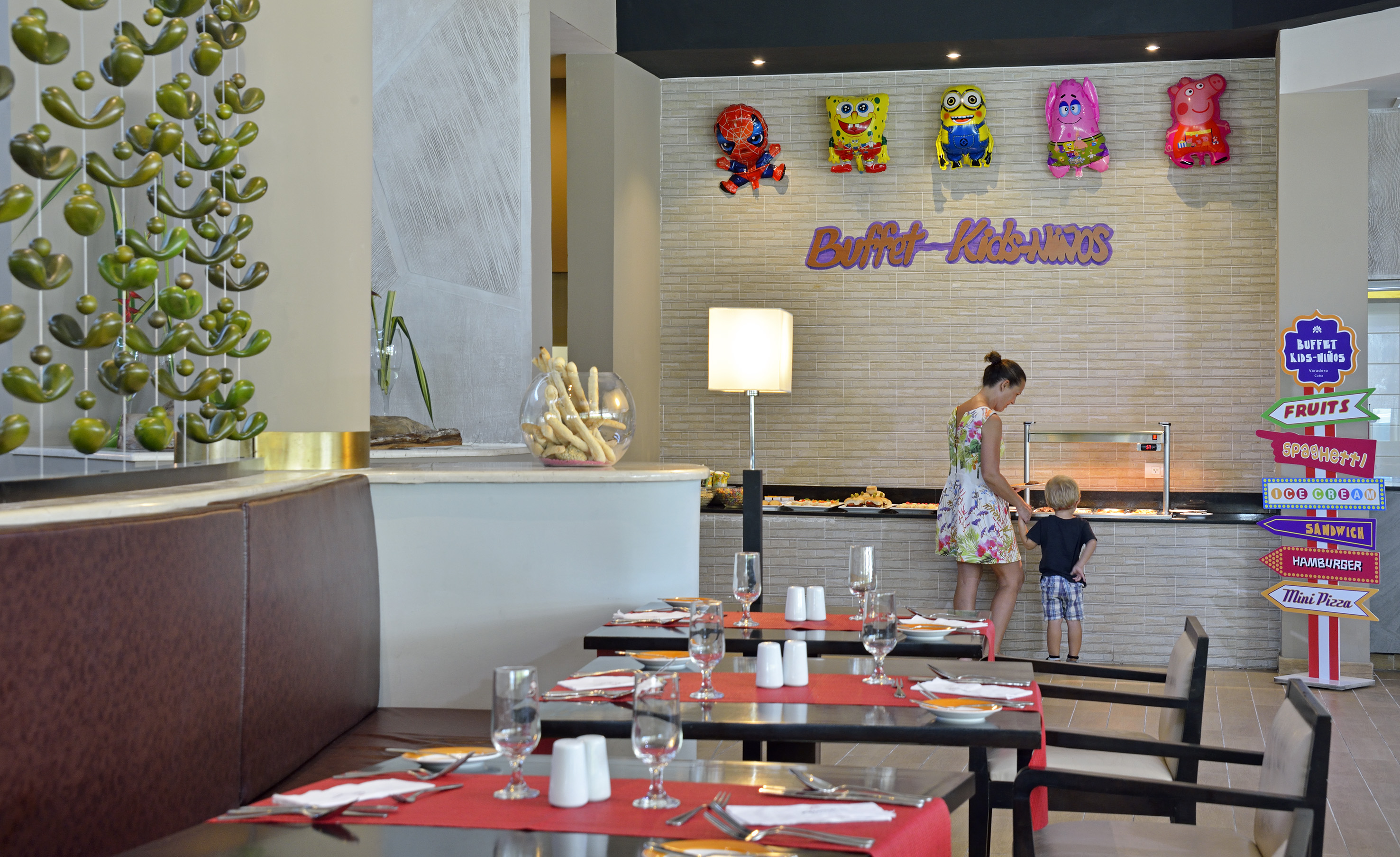 a woman and a child in a restaurant