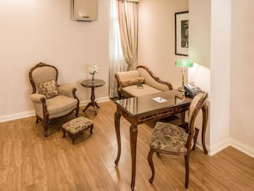 a room with a table and chairs