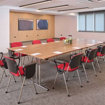 a room with a table and chairs