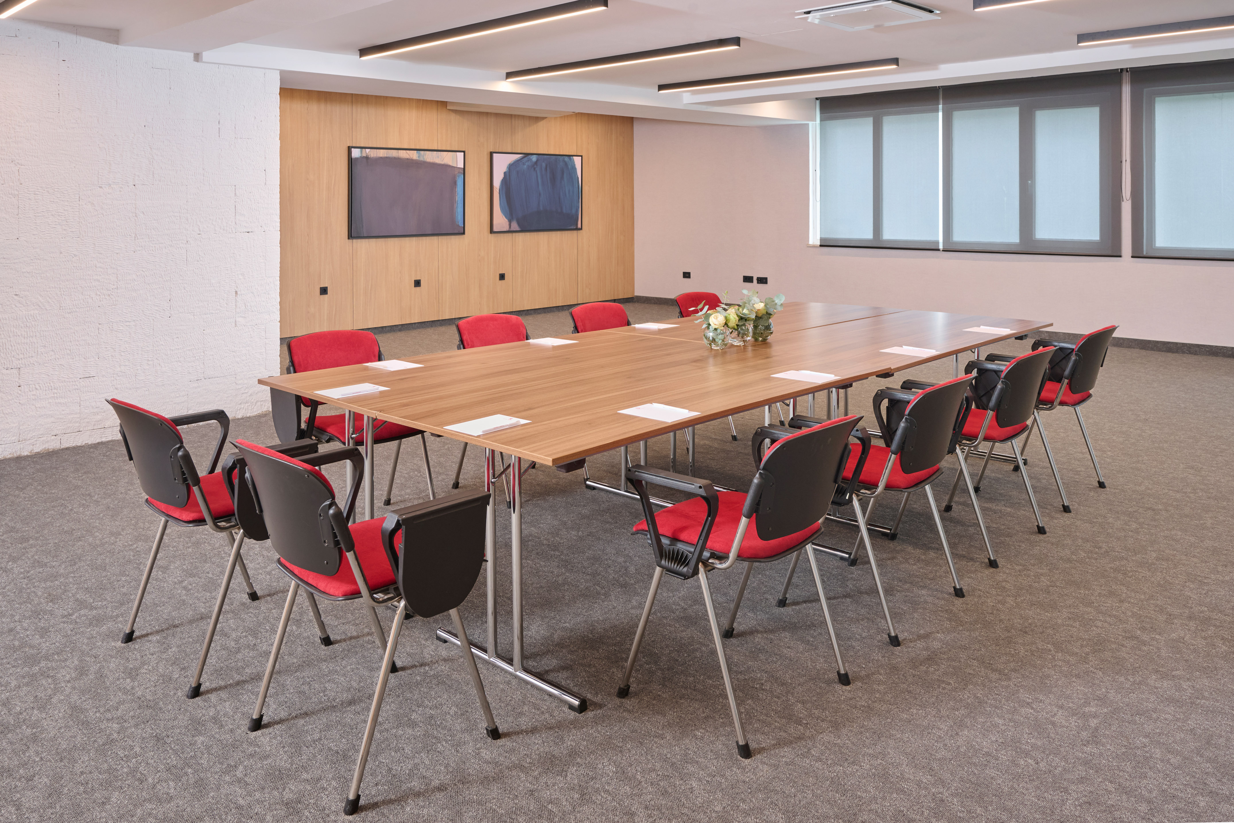 a room with a table and chairs