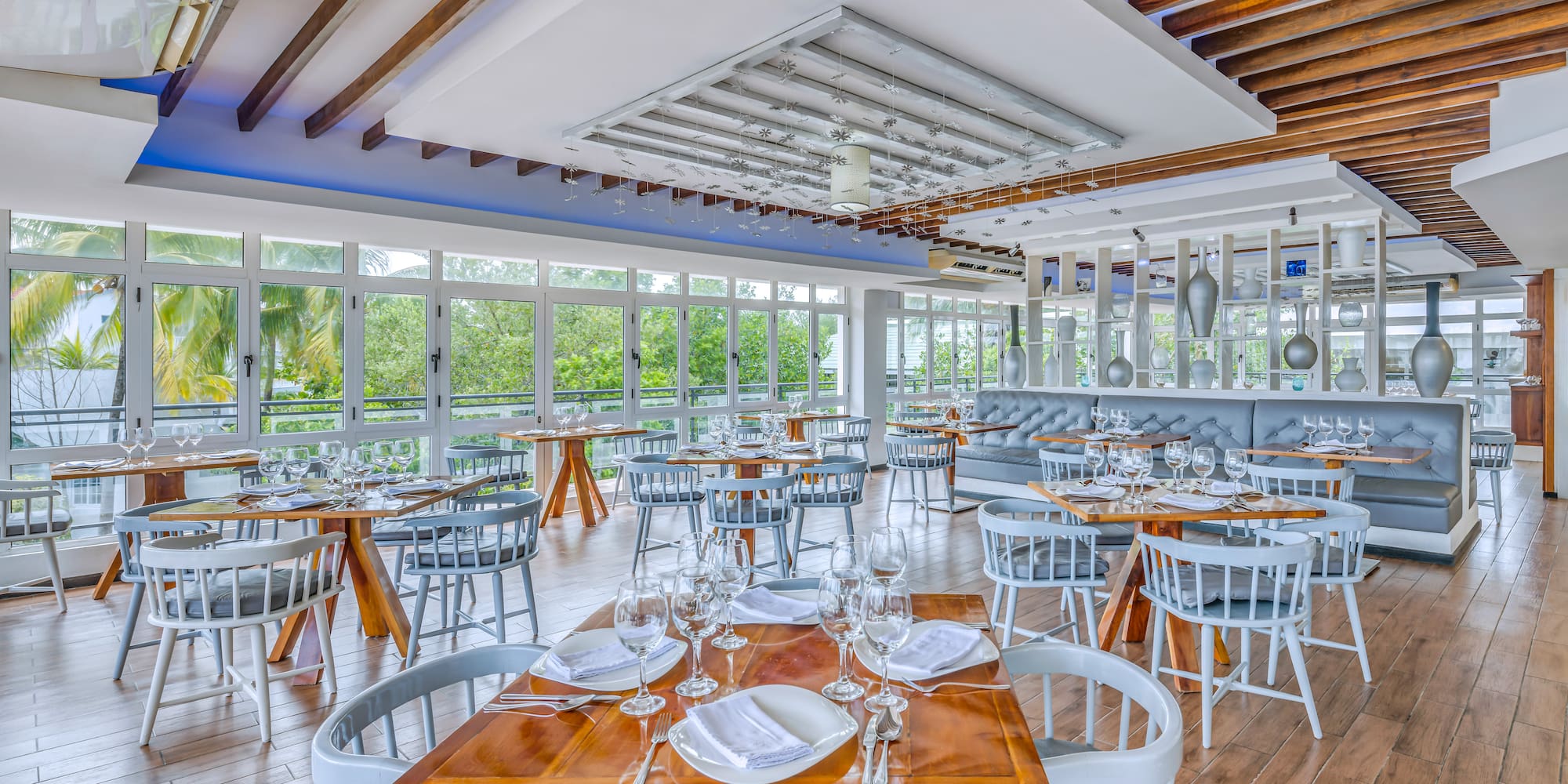 a restaurant with tables and chairs