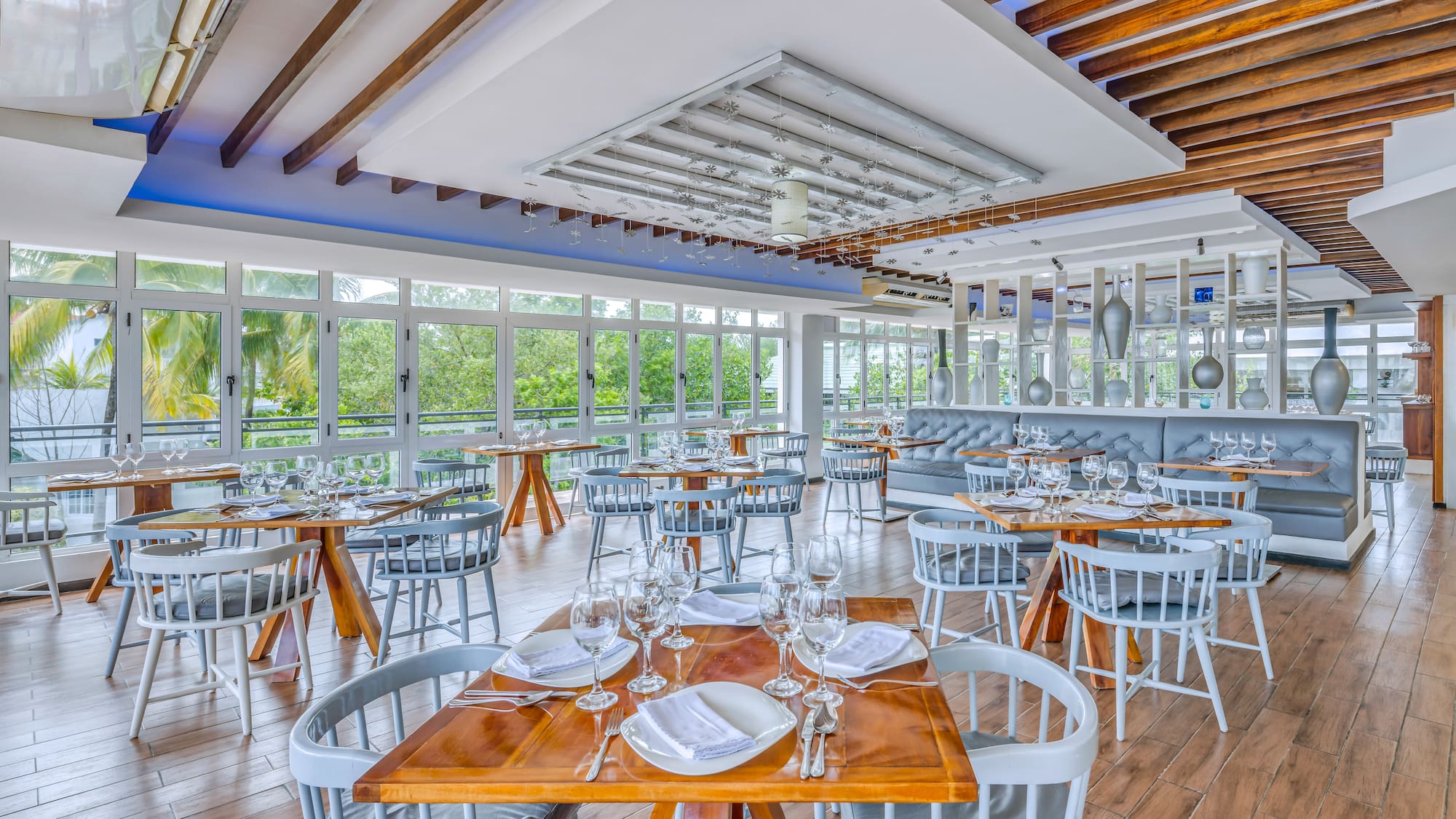 a restaurant with tables and chairs