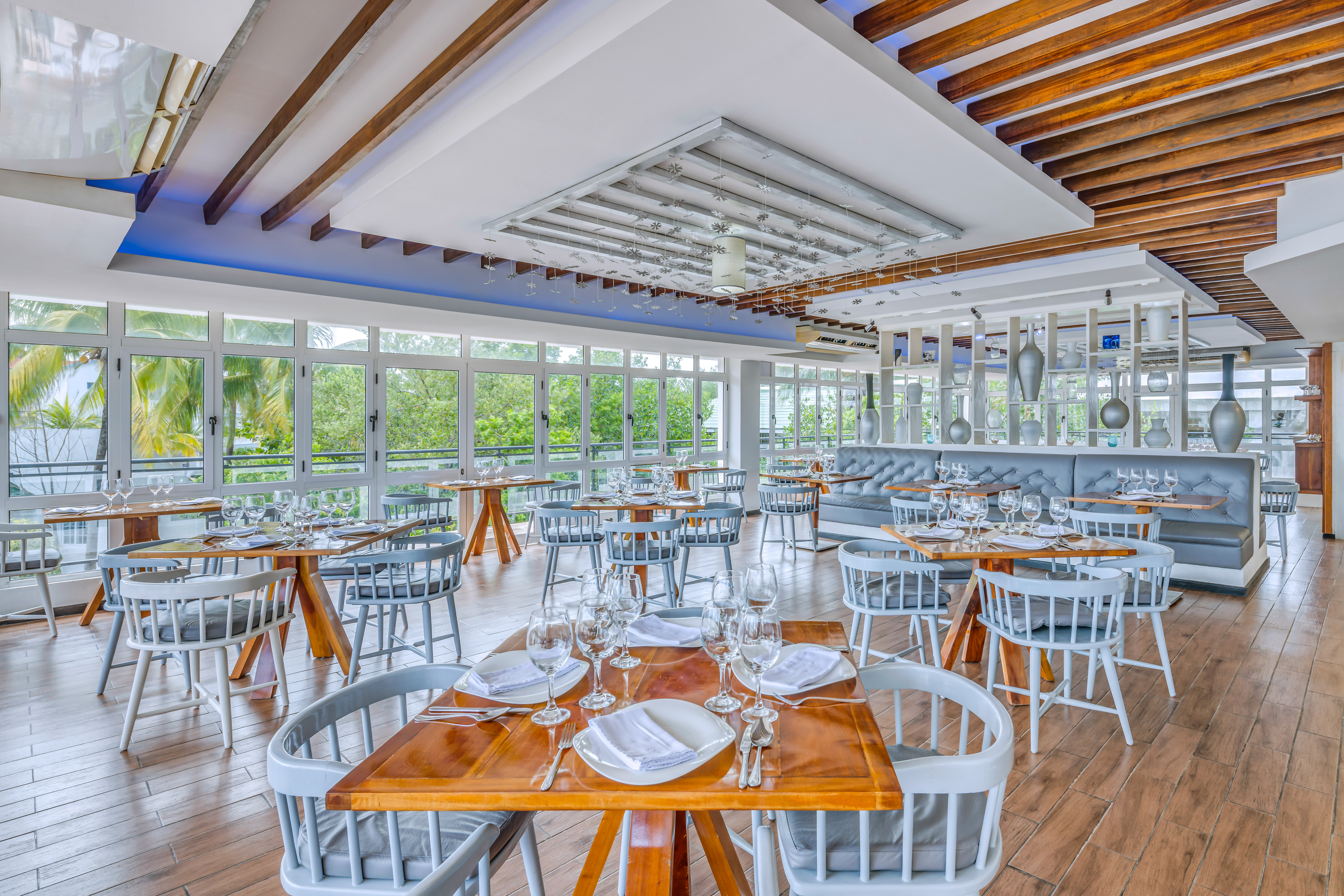a restaurant with tables and chairs