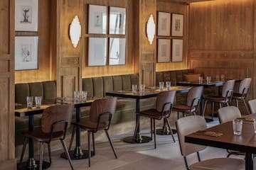 a room with tables and chairs