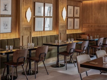 a room with tables and chairs