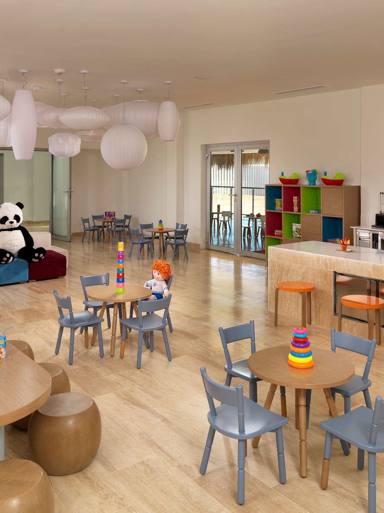 a room with a large table and chairs