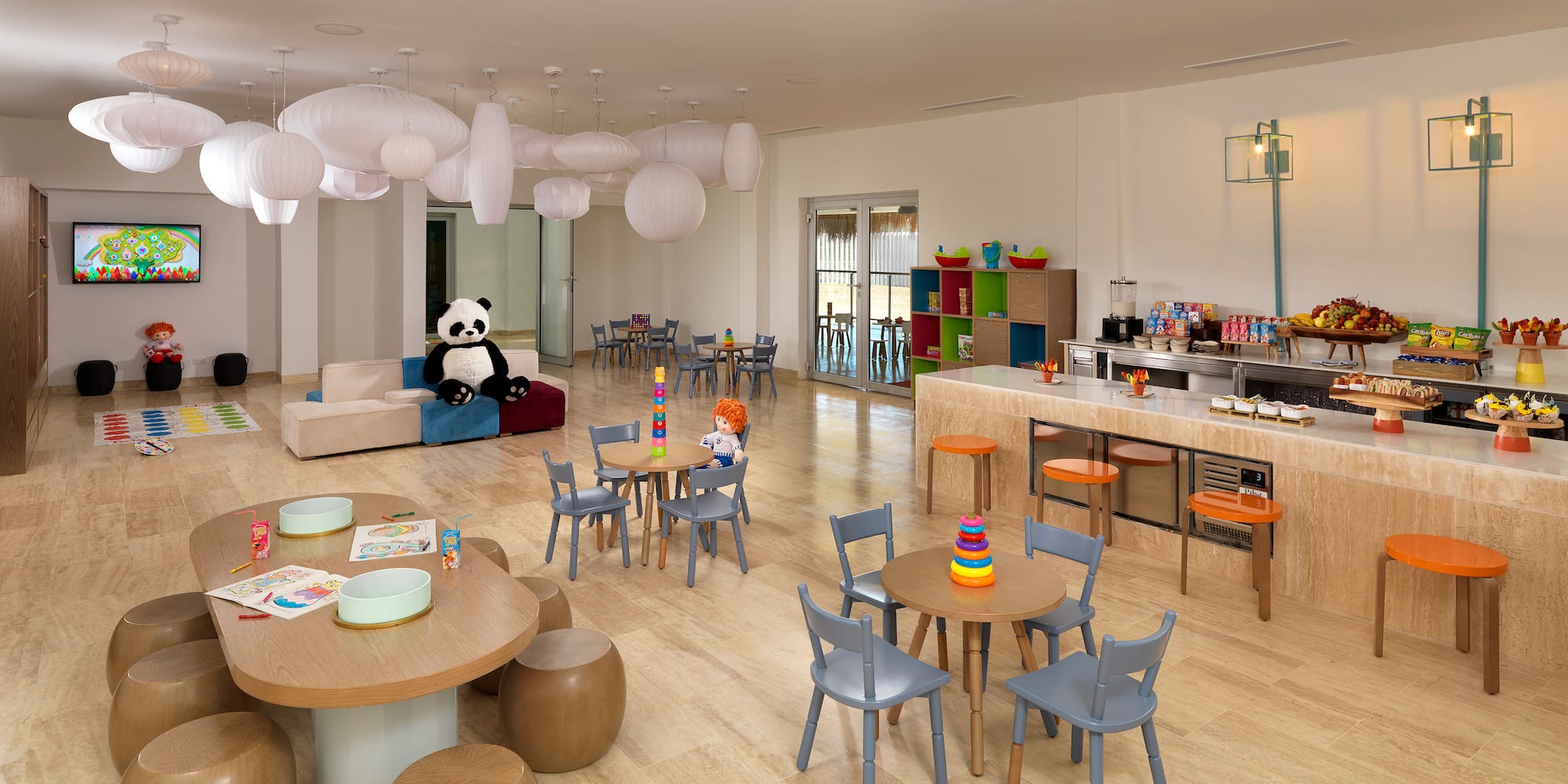 a room with a large table and chairs