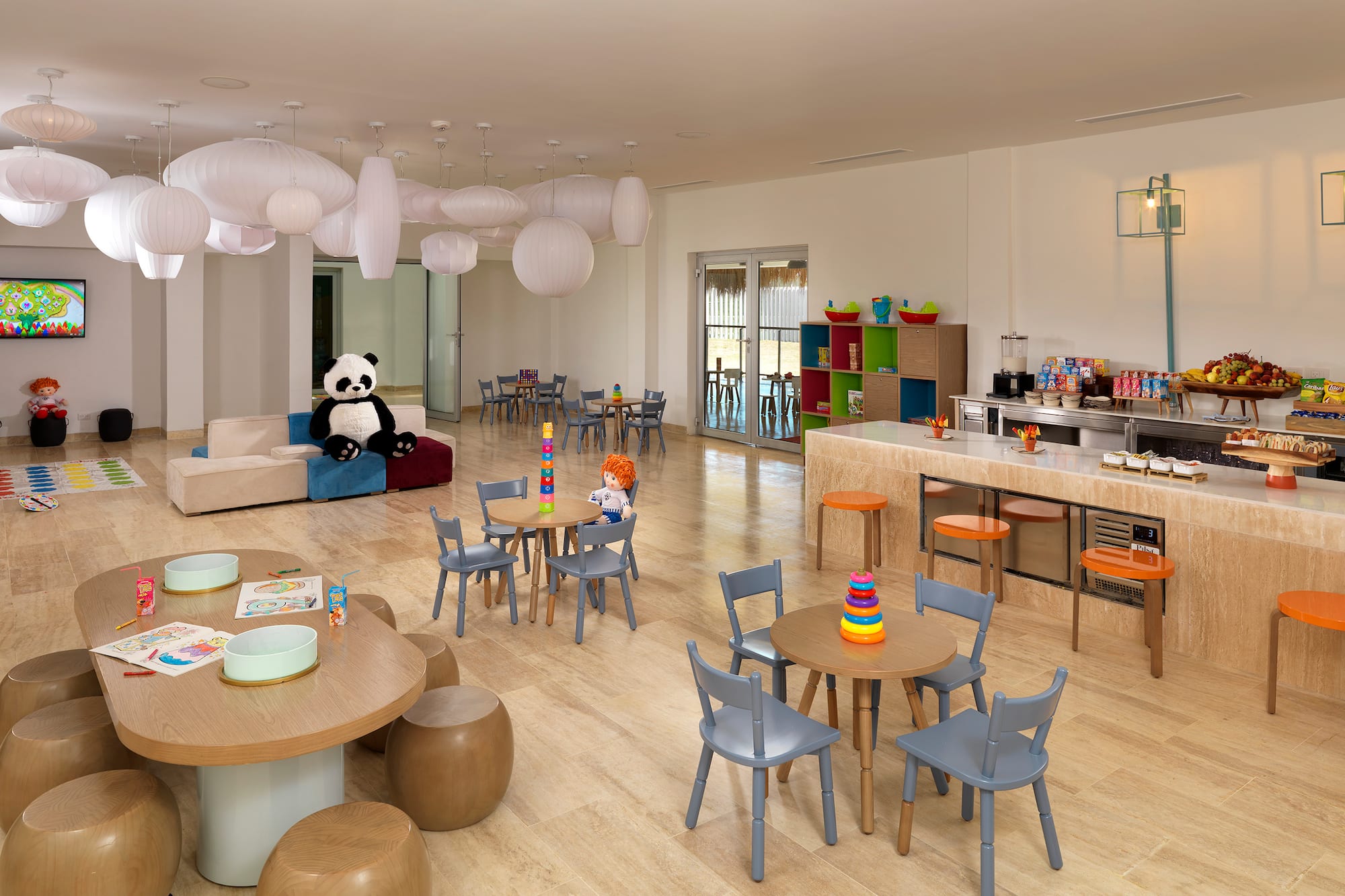 a room with a large table and chairs