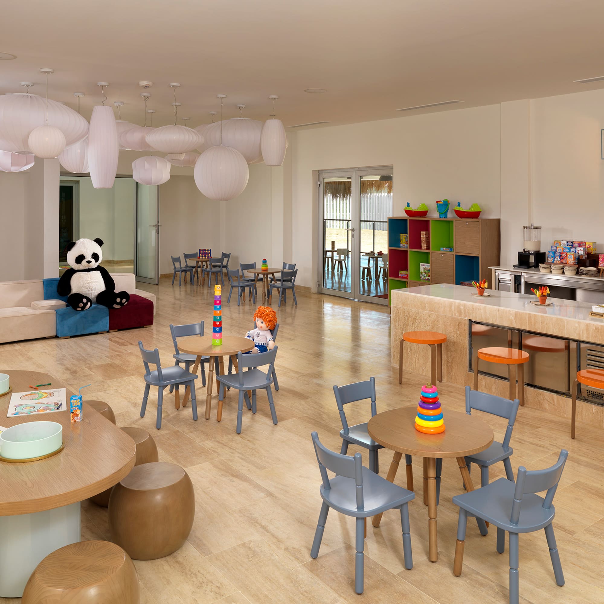 a room with a large table and chairs