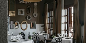 a room with tables and chairs