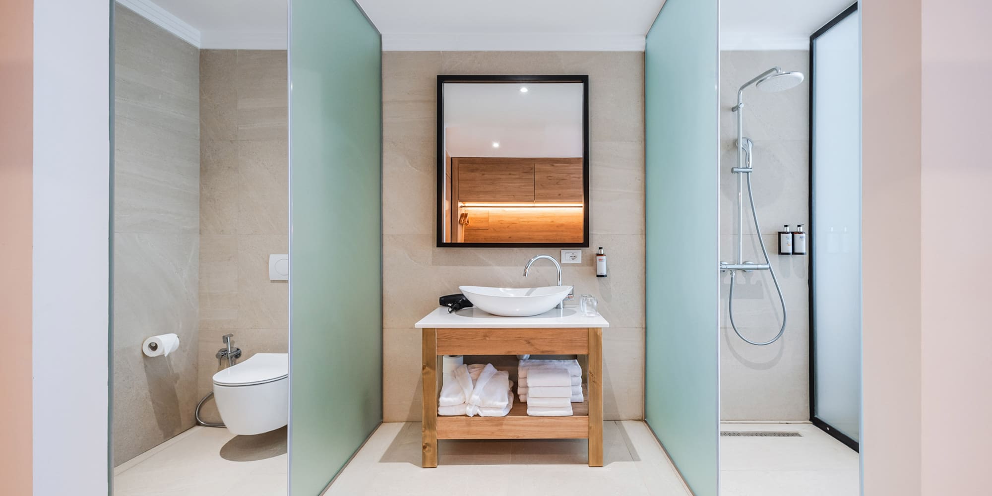 a bathroom with a sink and shower