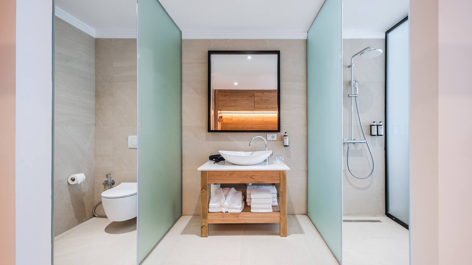 a bathroom with a sink and shower