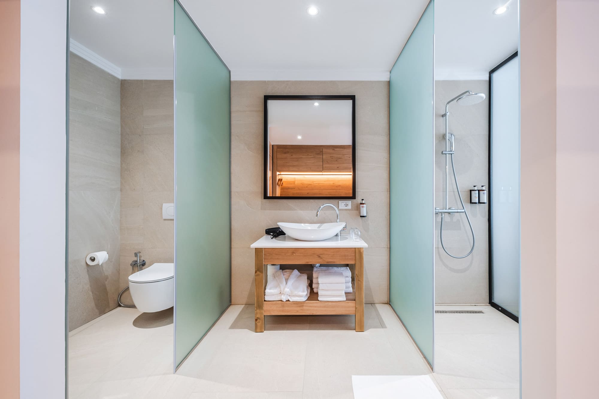 a bathroom with a sink and shower