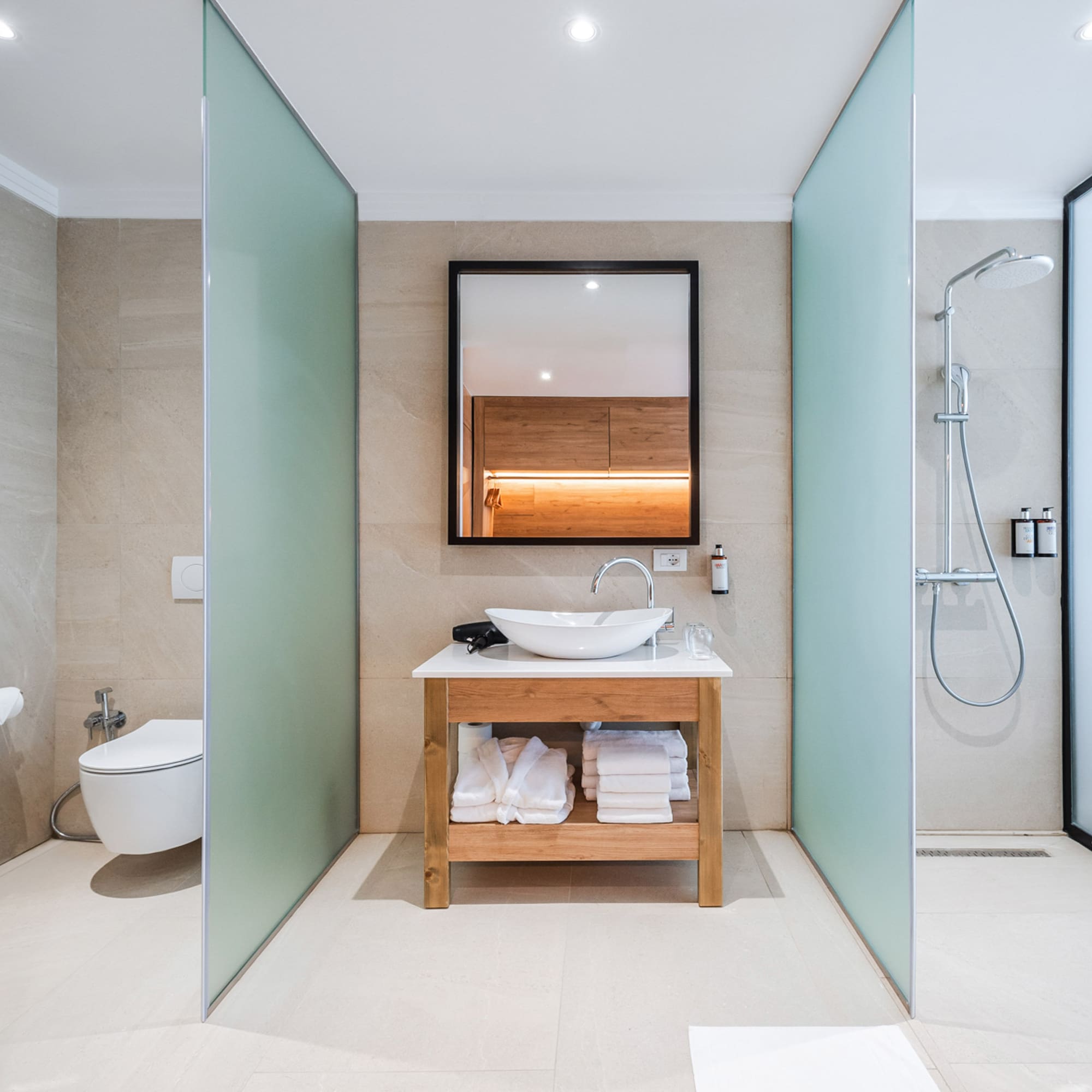 a bathroom with a sink and shower