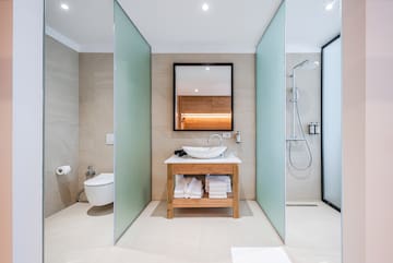 a bathroom with a sink and shower