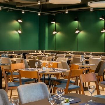 a room with tables and chairs