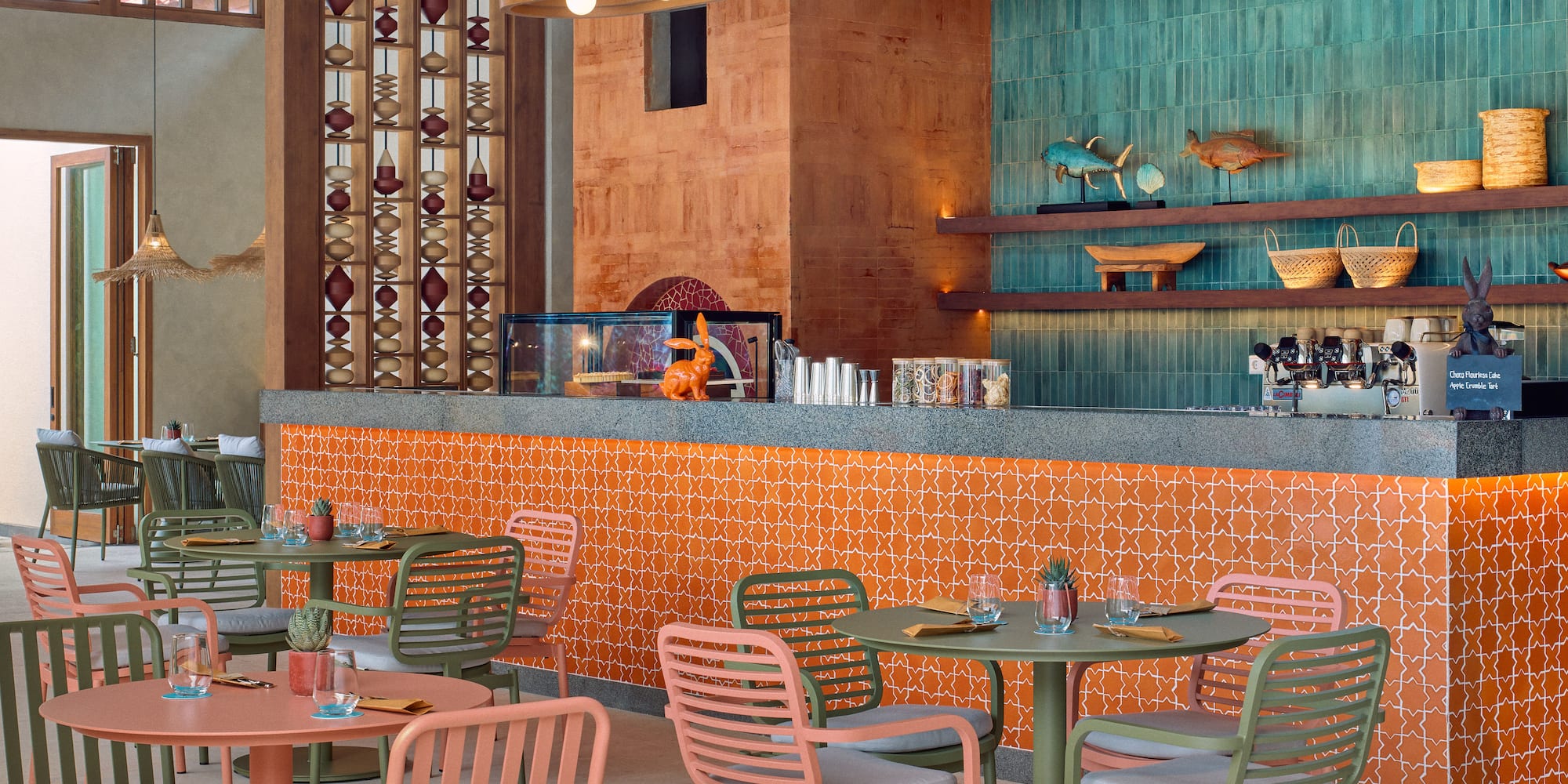 a restaurant with tables and chairs