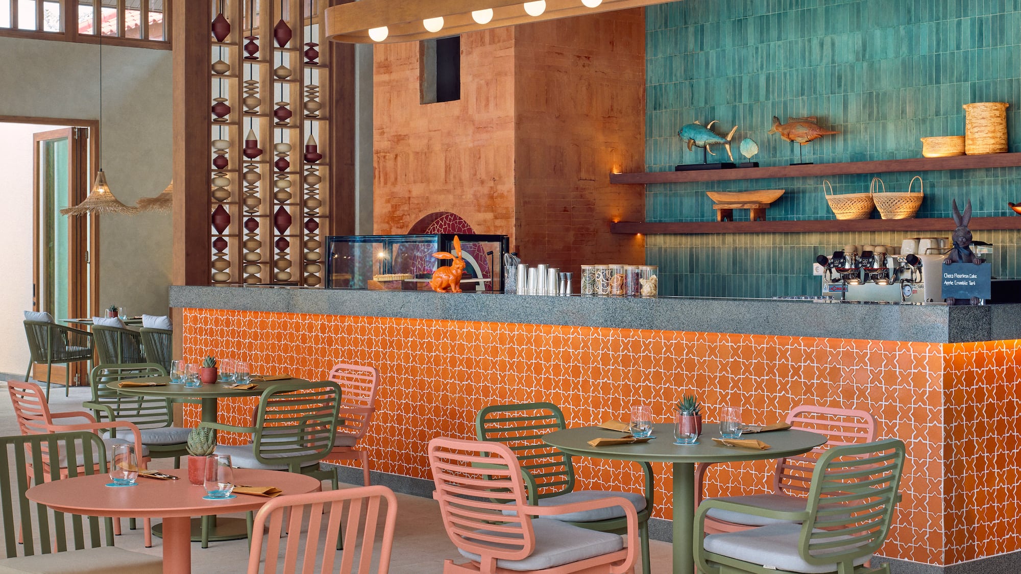 a restaurant with tables and chairs